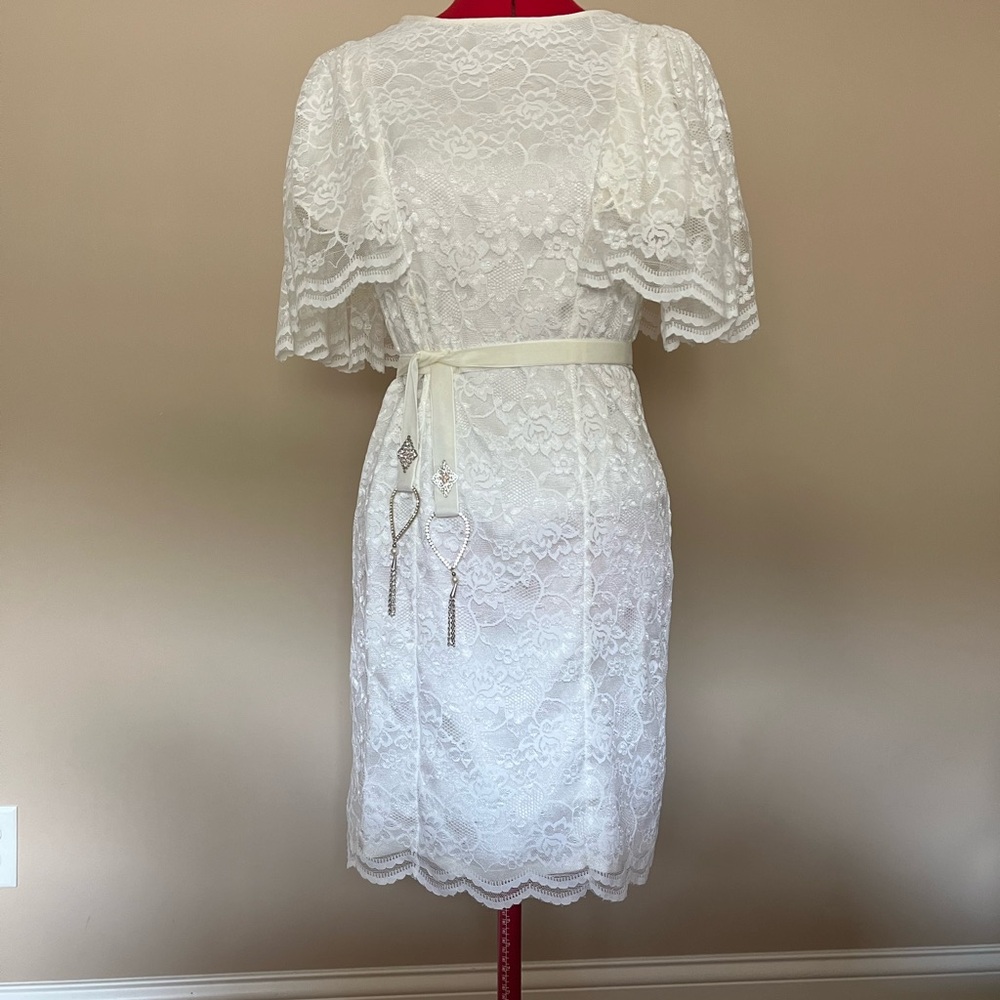 White lace midi dress. Unique design. Belt length is adjustable